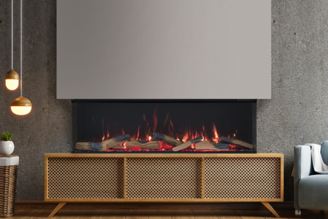 This shows the beautiful vision futura VF1300 electric fire. In this picture the fire has a panoramic fire view, this means the fire has 3 glass sides to it.
